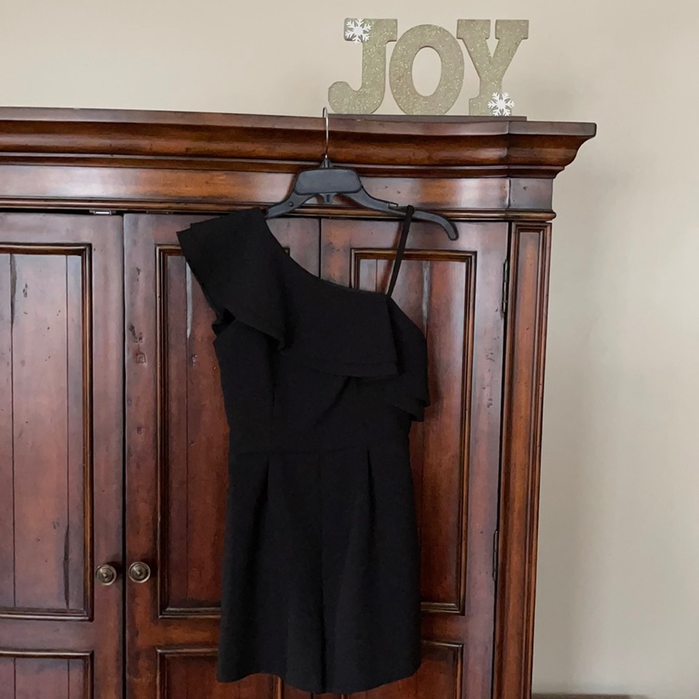 Beautiful black romper - size 4